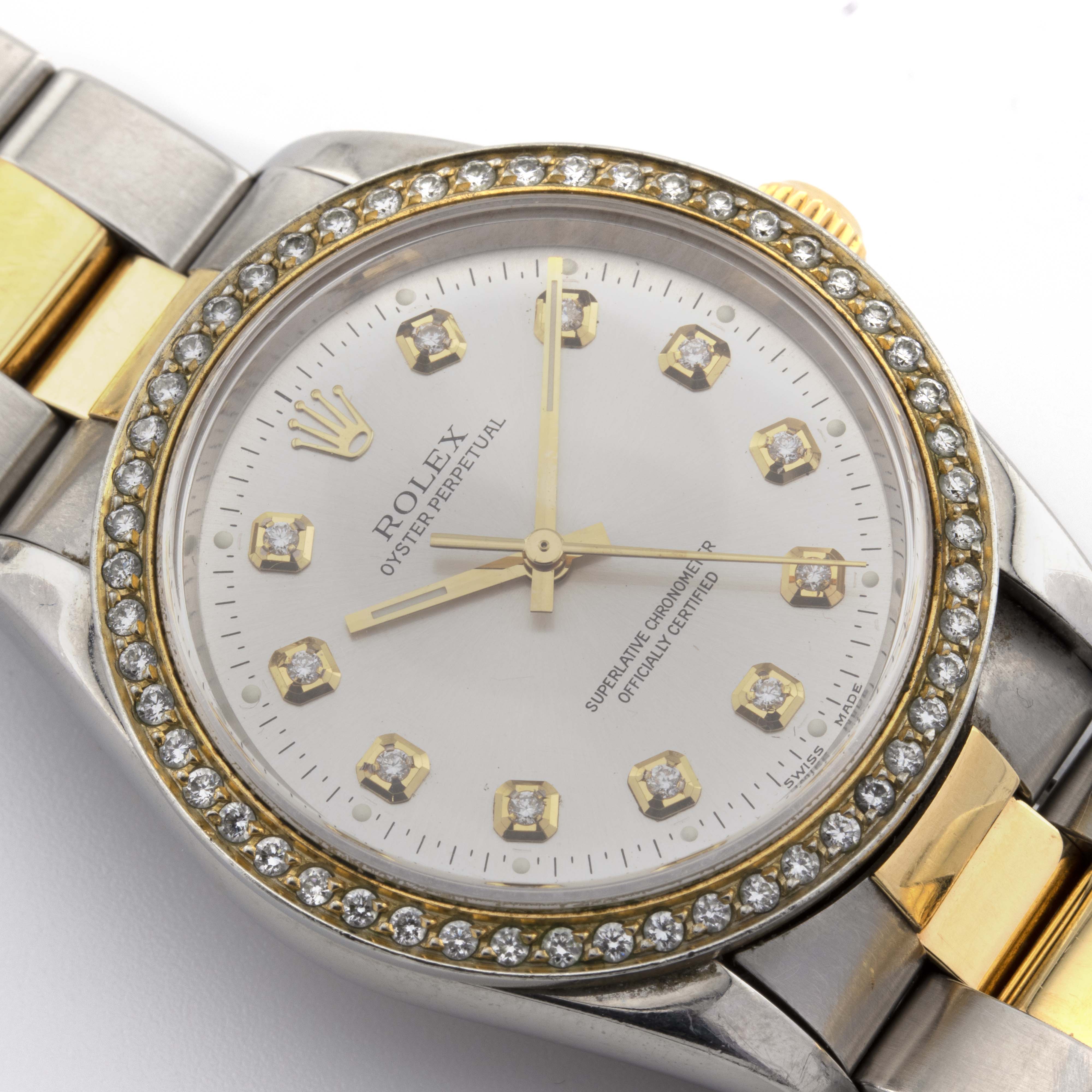 Rolex 36mm Datejust Two Tone SS / Yellow Oyster Band 1 Row Channel Set Diamond Bezel Cream Diamond Dial