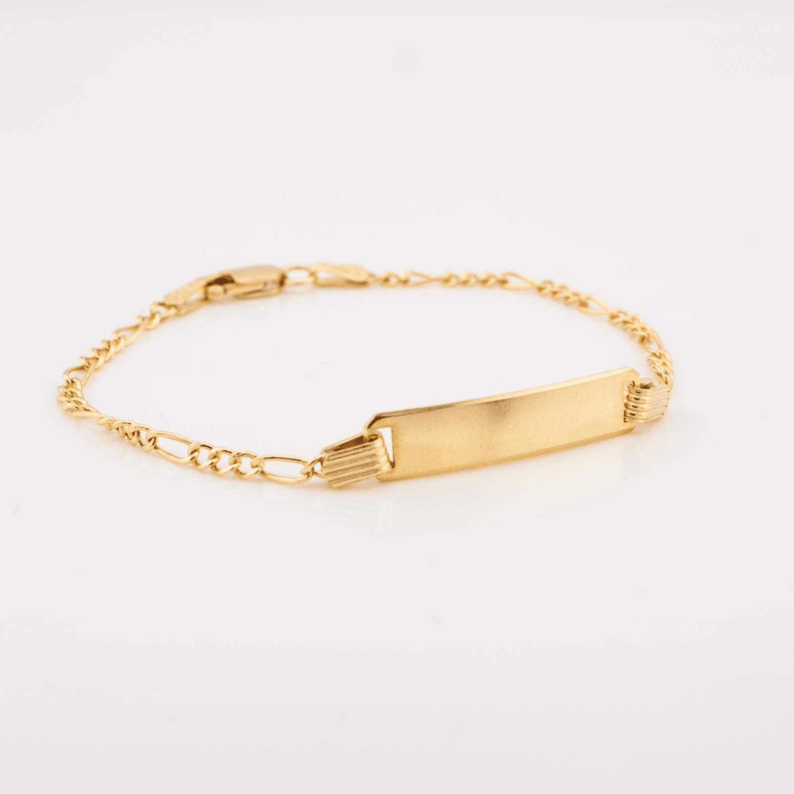 10kt Yellow Gold Figaro Baby Bracelet Ã¢â‚¬â€œ 5.5'' Length, 5mm Engravable ID - Elite Jewelers - Bracelets