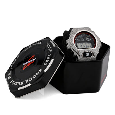 G-Shock digital watch in a black box on a white background