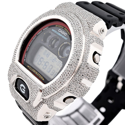Digital watch with a diamond-studded casing on a white background