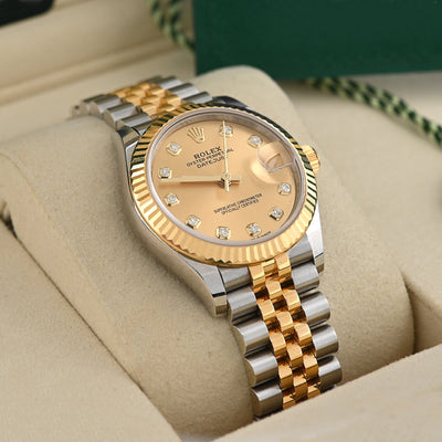 Rolex 31MM 18K Yellow Gold Diamond Dial Fluted Bezel Champagne Face Jubilee Band Full SET 2025 - Elite Jewelers - Luxury Watch